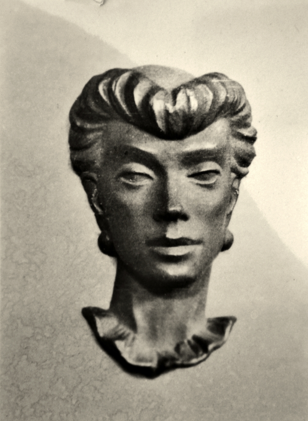 Kvinna -Väggskulptur